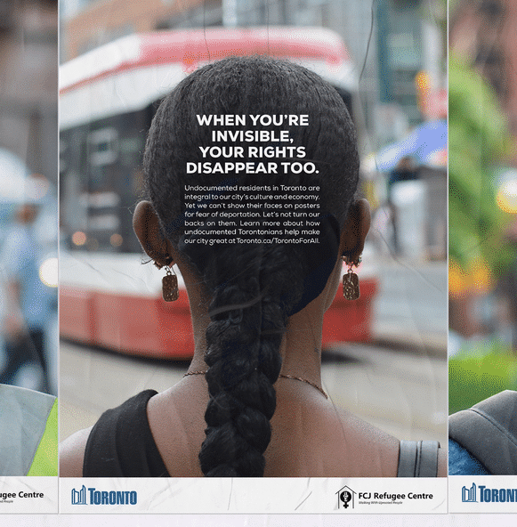 Image of posters in the city of Toronto with various headlines that denote how being "undocumented" should not mean "unrecognized"